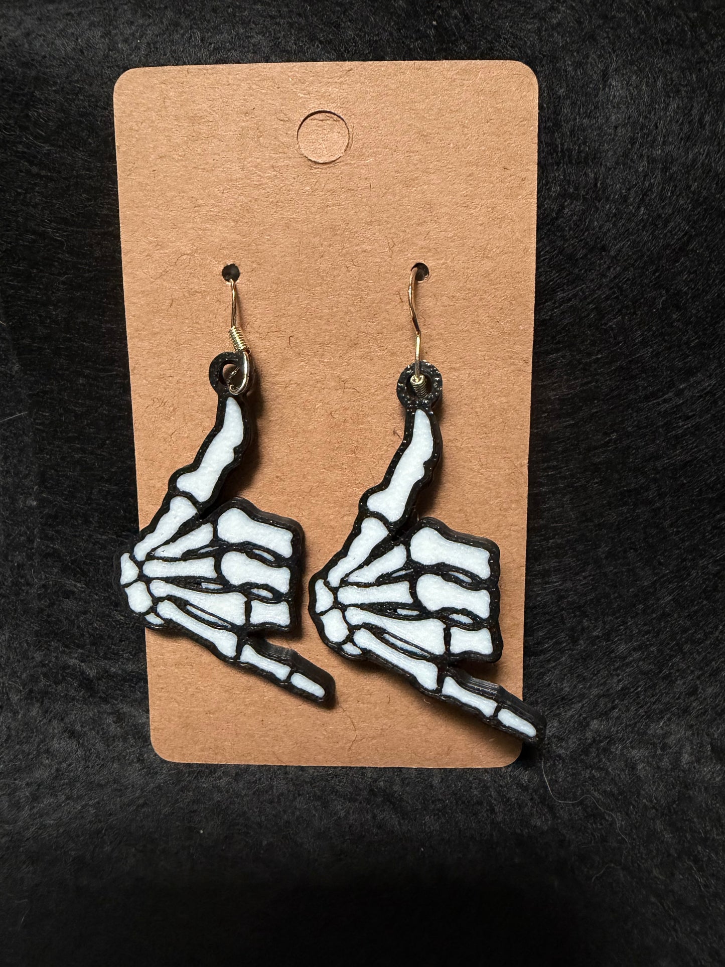 Hang loose skeleton hand earrings